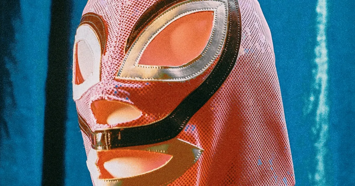 Close-up of a pink lucha libre mask